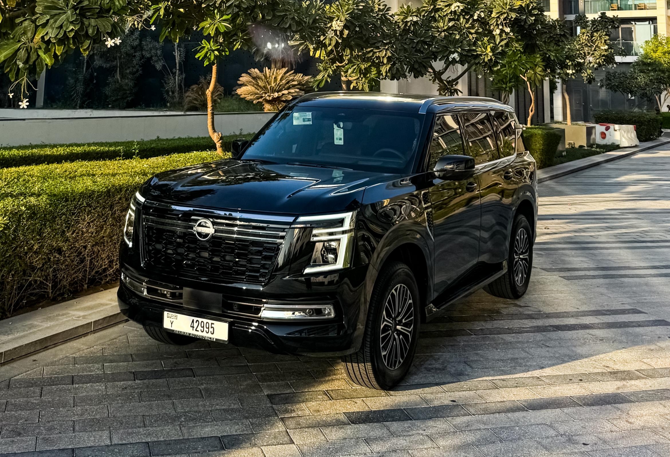 Nissan Patrol Platinum Black interior Red  2026 rental dubai